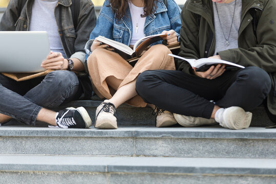 Anonymous College Student Classmates Studying Together