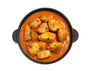 Delicious chicken curry in pan on white background, top view