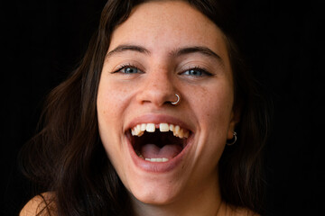 close up of a beautiful woman smiling with diastema