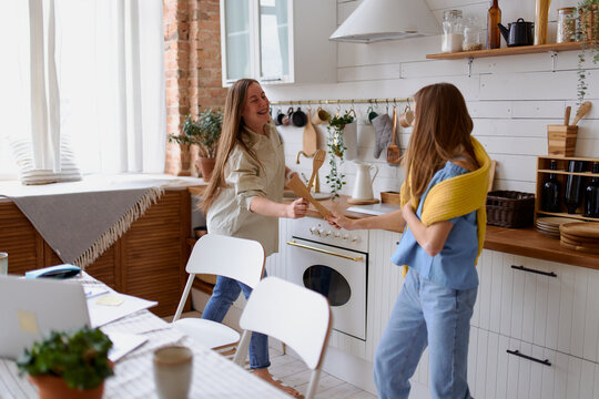 Elementary school girl with mother doing her homework