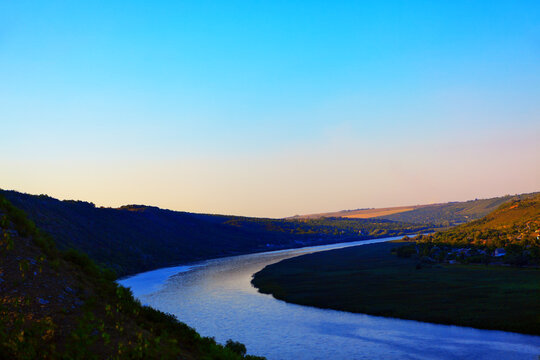 Winding river and hills landscape . River Dnister in Moldova , Tipova riverside