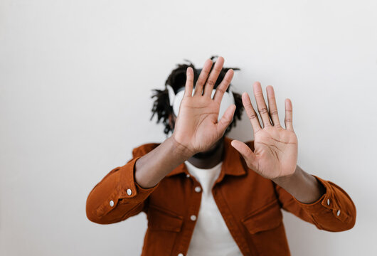 Man interacting with virtual reality on white background