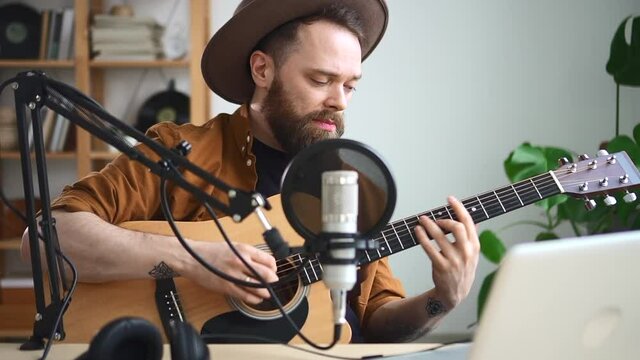 Popular musical radio show bearded man plays guitar music Spbd