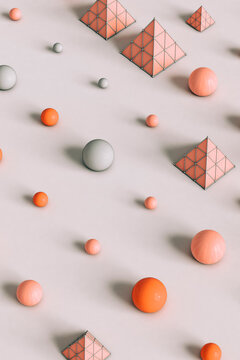pattern of Pink pyramids and spheres