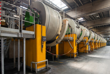 Tannery. Large metal barrels for leather dyeing