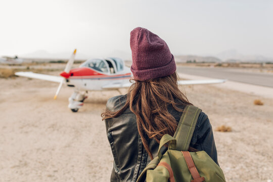 Young couple ready to take a flight in a small plane