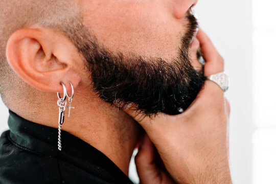 Portrait of moden man wiearing piercings