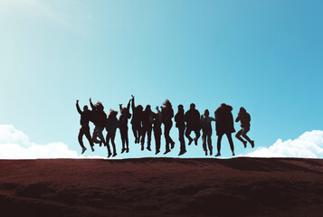 Happy friends jumping together