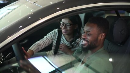 Choosing automobile African-American man with wife in car Spbd