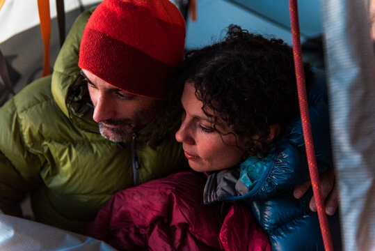 Climbers inside a wall tent in winter