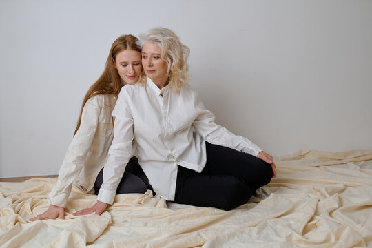 portraits of mother and daughter on the background