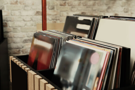 Rack with different vinyl records in store