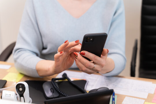 Middle Age Woman Using Phone
