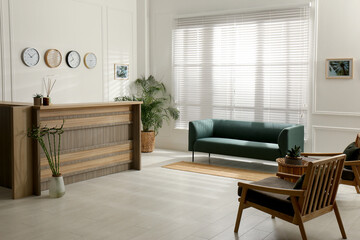 Hotel lobby interior with wooden reception desk. Stylish workplace