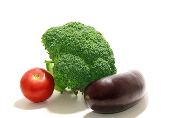 vegetables the cabbage, tomato, an eggplant isolated on a white background , seasonal maturing of vegetables in agriculture