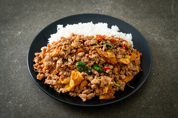 stir-fried minced pork with basil and egg topped on rice