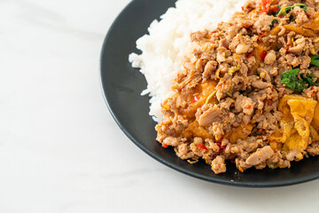 stir-fried minced pork with basil and egg topped on rice