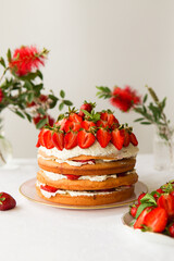 Strawberry cake. A beautiful cake decorated with strawberries.