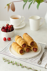 Homemade sausages in the dough. Breakfast.