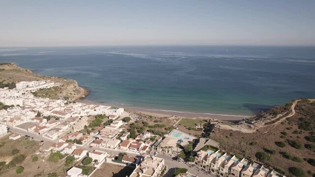 Aerial Atlantic ocean view from a small fishing village of Praia do Burgau, Budens Algarve Portugal.