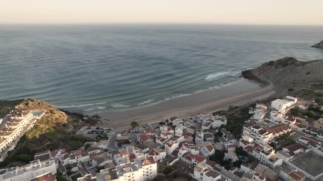 Panoramic aerial view of a small beach of Praia do Burgau, Algarve Budens Portugal.