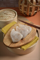 traditional chinese teo chew steam salted sticky rice peach cake kueh snack appetiser food with beautiful display and color halal dim sum menu