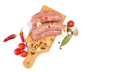 Raw pork sausages.Grilled sausages in close-up, isolated on a white background.Selective focus.