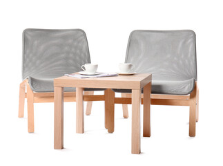 Stylish chairs with table on white background