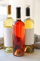 Bottles of exquisite wine on light table