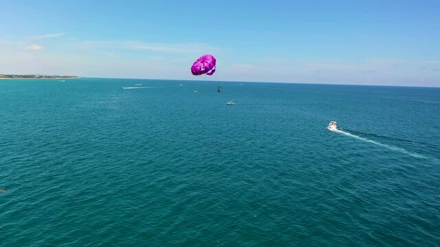 Purple Parasailing in the Atlantic Ocean in South Florida