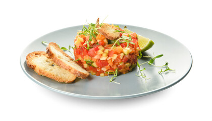Plate with tasty tartare salad, toasted bread and lime on white background