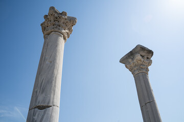 Columns of Tauric Chersonesos close-up against the blue sky. BC history and life concept. Tourism.