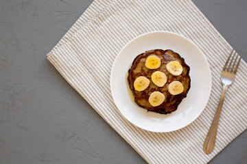 Homemade Banana Pancakes with Honey, top view. Flat lay, overhead, from above. Copy space.