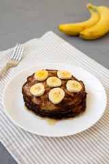 Homemade Banana Pancakes with Honey, side view.