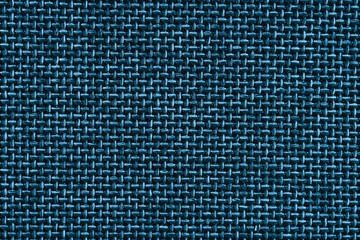 Blue texture of fabric from a textile material for an abstract background for an empty surface and...