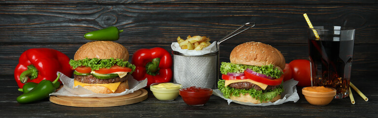 Concept of tasty food with delicious burgers