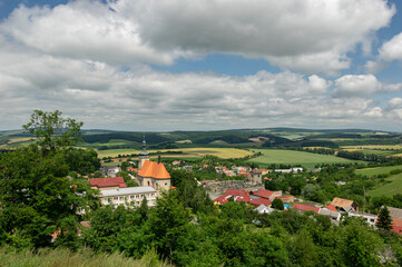 Fototapeta na wymiar Landscape view on the protectec baroque cemetery of Strilky village from Czech Republic