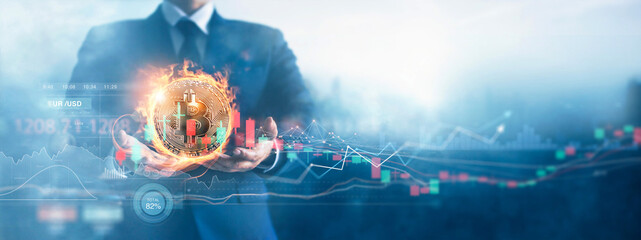Hands of businessman and gold bitcoin coin in fire with volatile business graph on global network, Financial, Stock market, Cryptocurrency and investment. - obrazy, fototapety, plakaty