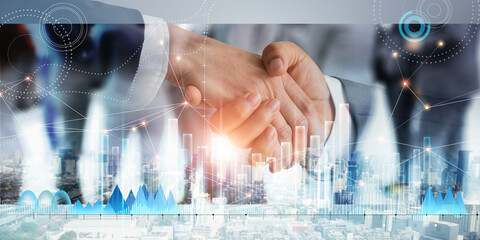 Shaking hands of partners for business on economic growth graph chart and global network connection of business. Business meeting and successful team.