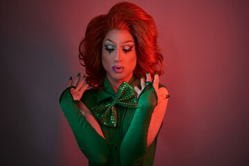 Fashionable transgender model with bright makeup