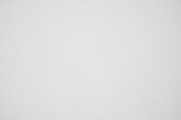 White textured wall background.