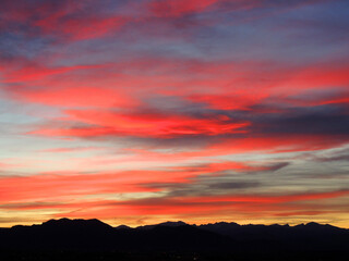 colorful sunset over  colorado's front range  of the rocky  mountains as seen from broomfield,...