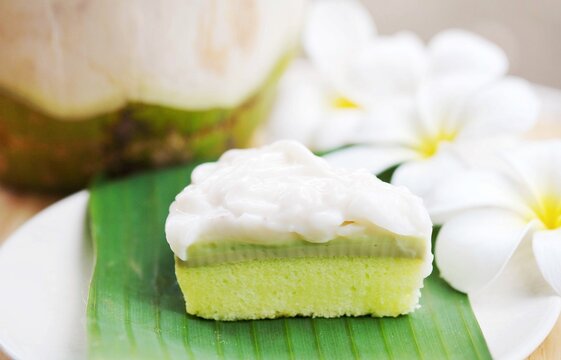 A piece of pandan and young coconut fresh cream cake.