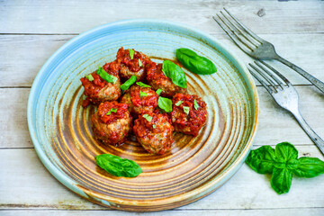 Tasty home made    italian  dish mini  meatballs baked in marinara tomato  sauce