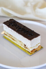 cream cake on wooden background