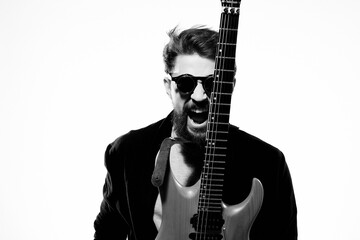 emotional male musician with guitar light background music