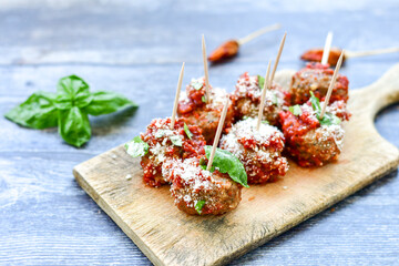 Tasty home made    italian  dish mini  meatballs baked in marinara tomato  sauce