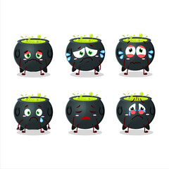 Witch cauldron cartoon character with sad expression