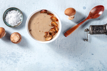 Mushroom soup ingredients, shot from the top with a place for text. Portobello mushrooms with salt and pepper