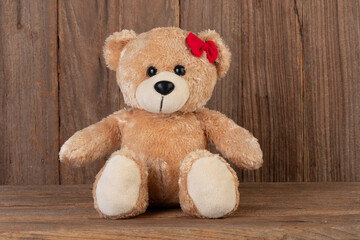 Teddy bear on wooden for your presentation product and decoration.